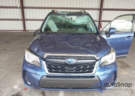 2017 Subaru Forester Touring z USA, uszkodzony, nr VIN JF2SJGTC0HH576884